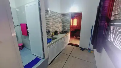 a bathroom with a sink and a shower in it at Studio Hamria Meknes in Meknès