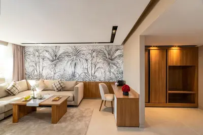 a living room with a couch and a table at Kenzi Rissani in Er Rachidia