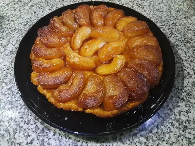 a pretzel pie on a black plate on a table at Riad Souafine in Fès