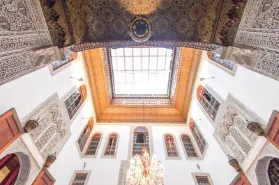 an overhead view of a building with a chandelier at Riad Fez Yamanda in Fès