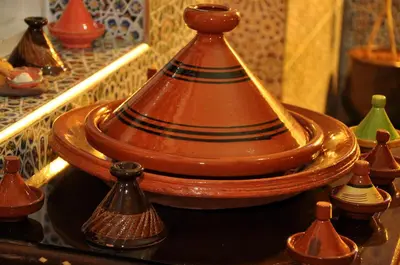 a group of vases sitting on top of a table at Dar Aliane in Fès