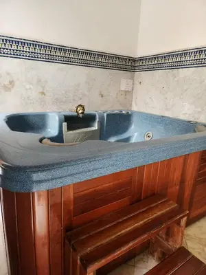 a large blue bath tub in a bathroom at Le Riad Palais d'hotes Suites & Spa Fes in Fès