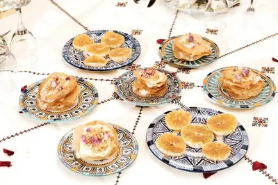 a group of plates of desserts on a table at Riad Dar Laura in Fès