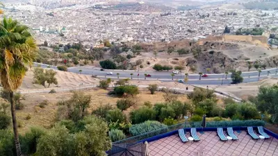 a view of a city from a hill at Les Mérinides in Fès