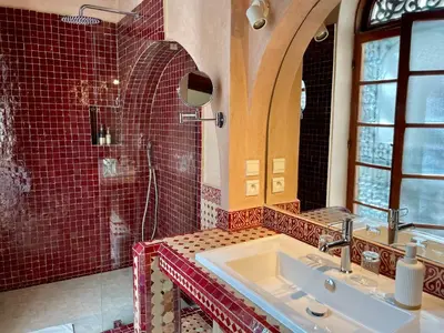 a bathroom with a sink and a shower at Riad Zamane Fès - Boutique & Spa in Fès