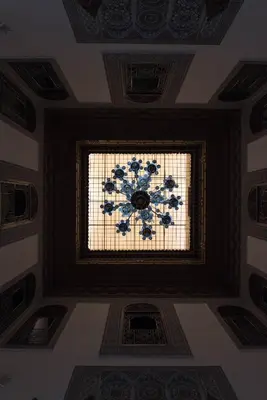 a ceiling with a glass window in a room at RIAD YOUSSEF in Fès