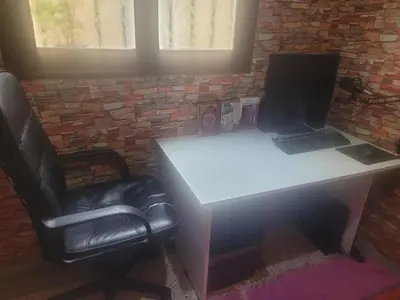 a white desk with a laptop and a chair at بيت مع وجبة إفطار لمشجعي كأس الأمم الأفريقية in Fès