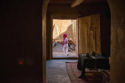 a person walking through a doorway in a room at Dar Bladi in Ouarzazate