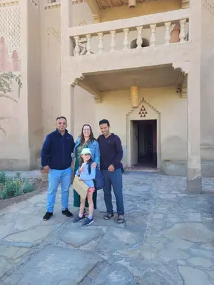 a group of people standing in front of a building at Dar Es Salam in Skoura