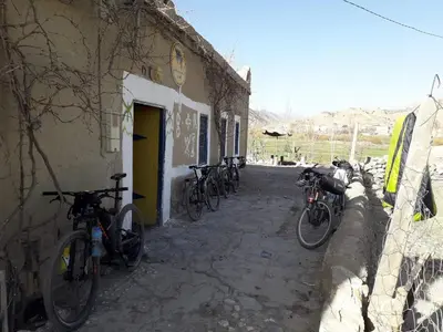 a group of bikes parked next to a building at Auberge Ouabas in Agoudim