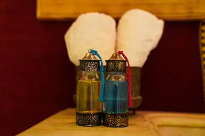 two salt and pepper shakers sitting on a table at Horaz Merzouga Camp in Merzouga